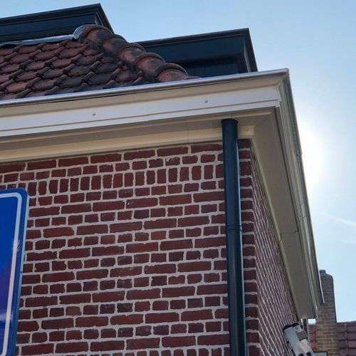 Foto van dakgoot in Malden